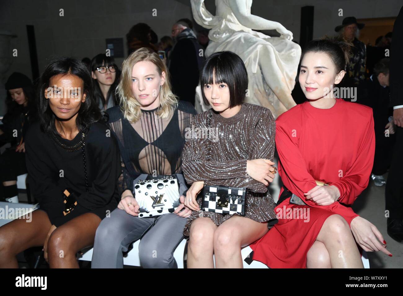 https://c8.alamy.com/comp/W7XXY1/south-korean-actress-bae-doo-na-second-right-and-chinese-actress-song-jia-right-attend-the-louis-vuitton-lv-fashion-show-during-the-paris-fashio-W7XXY1.jpg