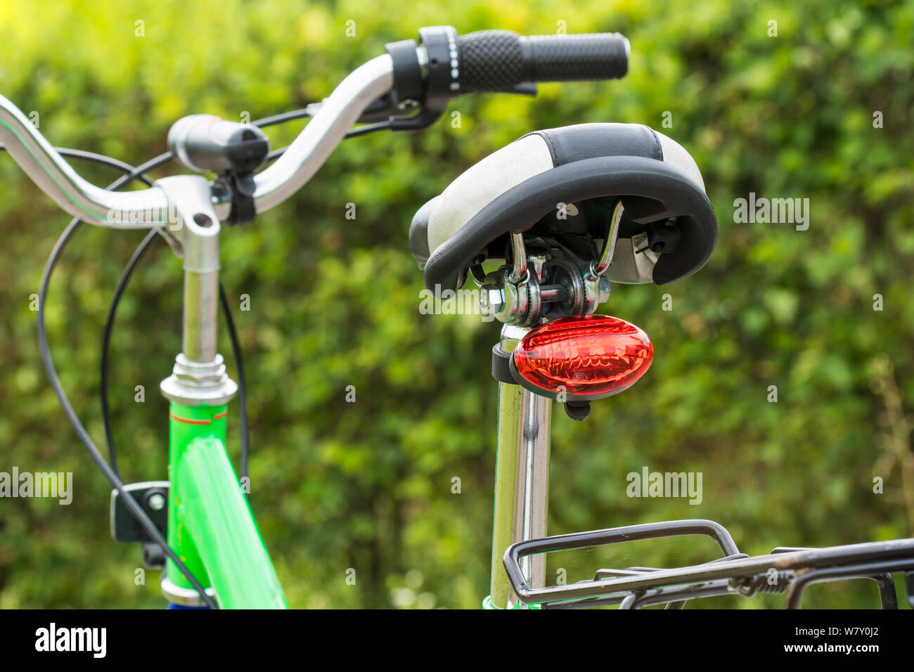 Rear view of a bicycle saddle on nature background Stock Photo - Alamy