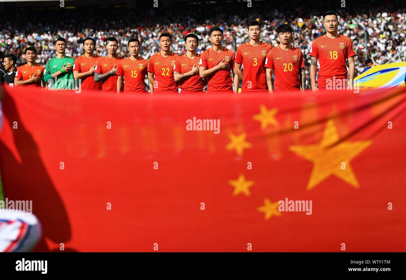 Players of the starting line-up of Chinese national football team pose before competing against Iran national football team in their Group A Round 7 m Stock Photo