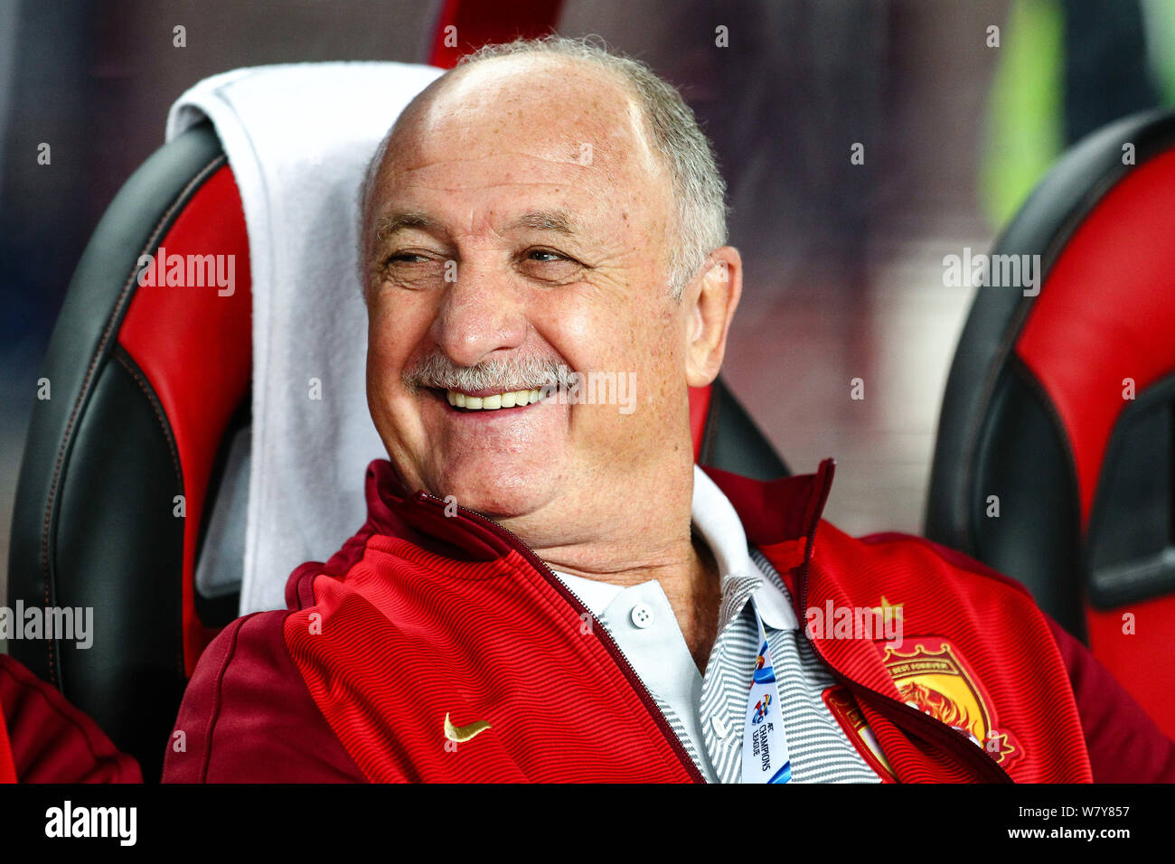 Head coach Luiz Felipe Scolari of China's Guangzhou Evergrande F.C. reacts as he watches his players competing against Japan's Kawasaki Frontale F.C. Stock Photo