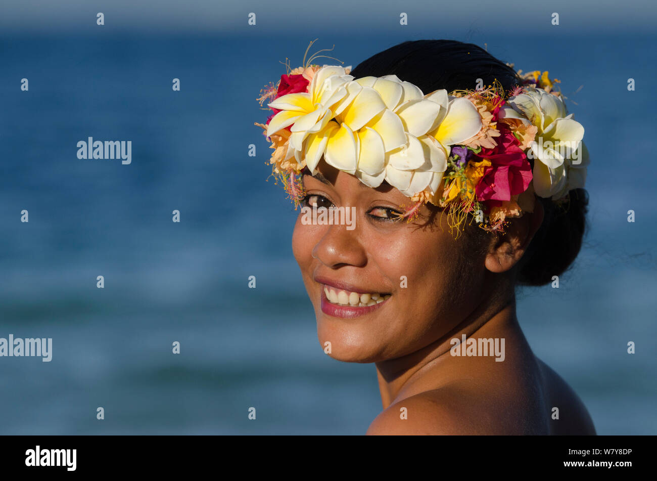Woman wearing traditional floral headdress for ceremony, Kioa Island, Fiji, South Pacific, July 2014. Stock Photo