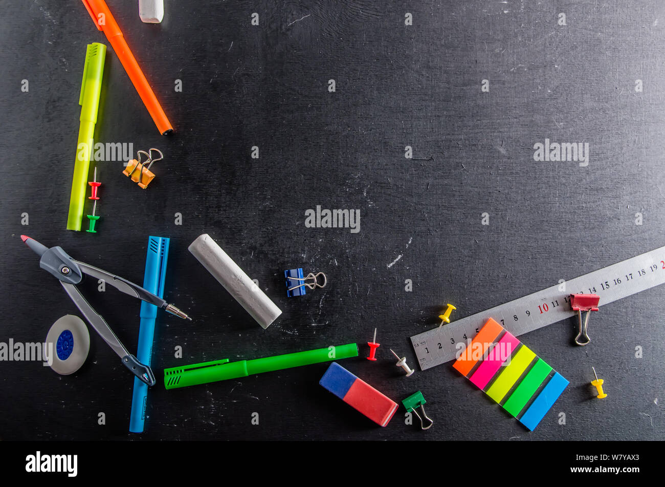 stationery on a black background back to school with copy space Stock Photo