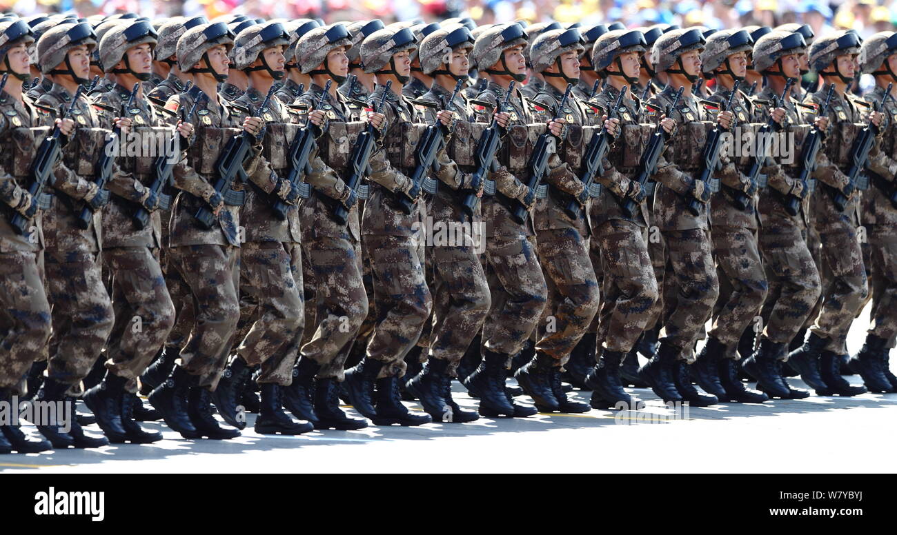 --FILE--Chinese PLA (People's Liberation Army) soldiers march past the Tian'anmen Rostrum during the military parade to commemorate the 70th anniversa Stock Photo