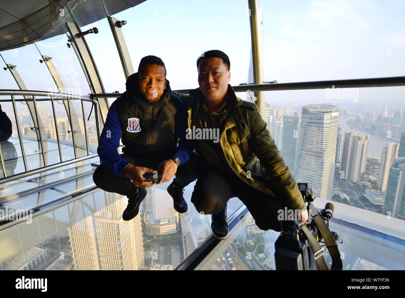 Colombian football player Fredy Guarin of Shanghai Greenland Shenhua F.C., left, attends a ceremony for Shanghai Greenland Shenhua F.C. to prepare for Stock Photo