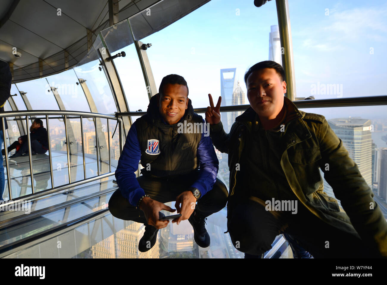 Colombian football player Fredy Guarin of Shanghai Greenland Shenhua F.C., left, attends a ceremony for Shanghai Greenland Shenhua F.C. to prepare for Stock Photo