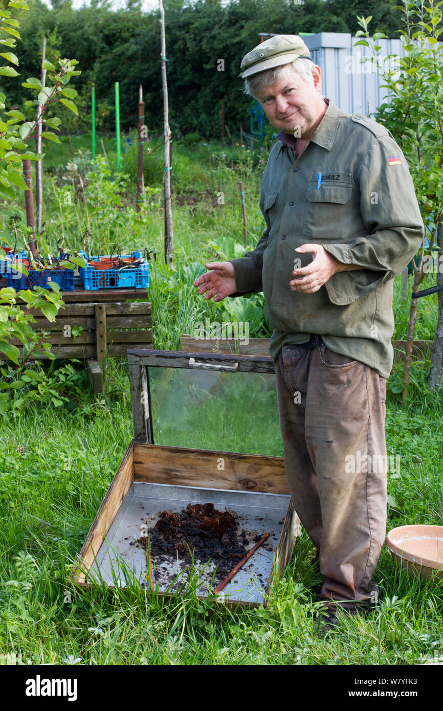 Homemade Wax extractor for melting down bees wax, in allotments Cwmbran, Gwent, Wales, UK. August 2014. Stock Photo