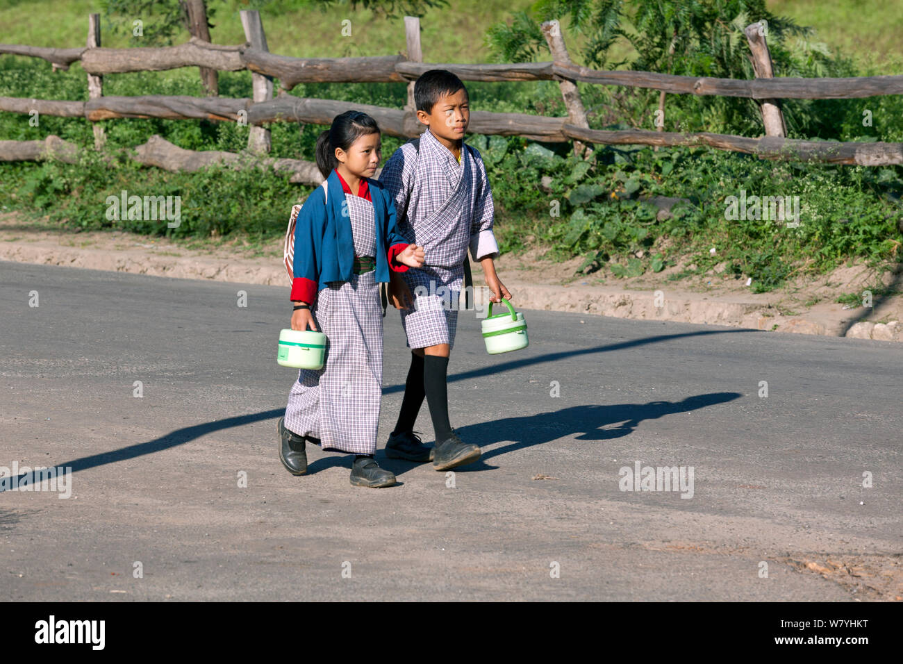 Children on the way to school, town of Punakha. Bhutan, October 2014. Stock Photo