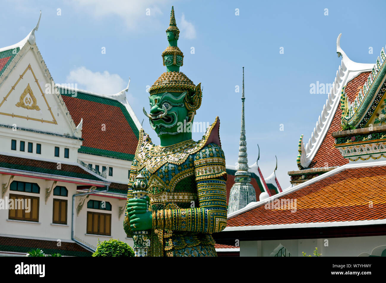 Temple figure and roof lines at Wat Arun in Bangkok. Thailand, September 2014. Stock Photo