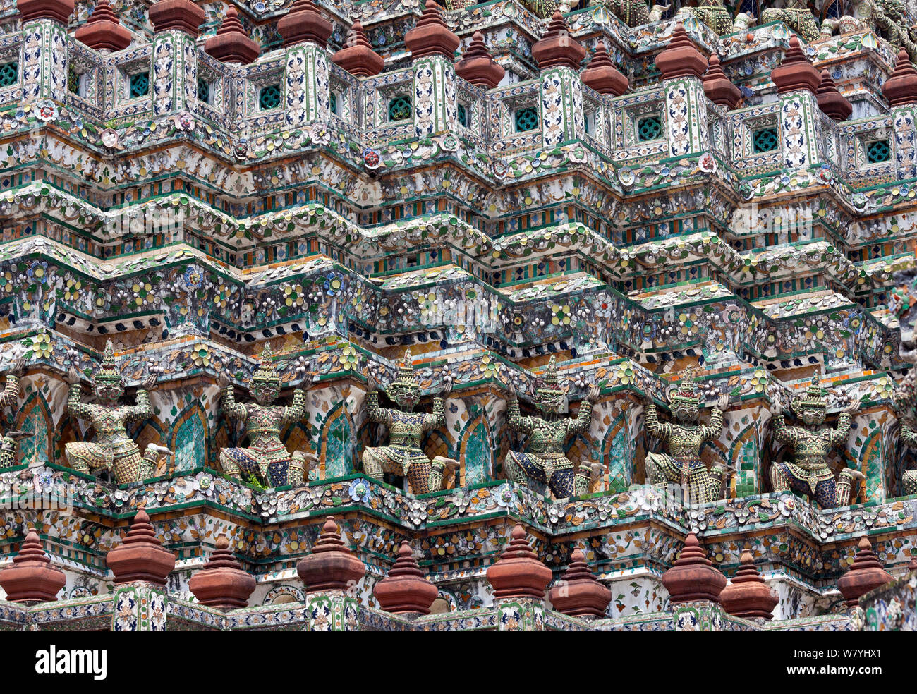 Statues on the walls of Wat Arun, Bangkok, Thailand, September 2014. Stock Photo