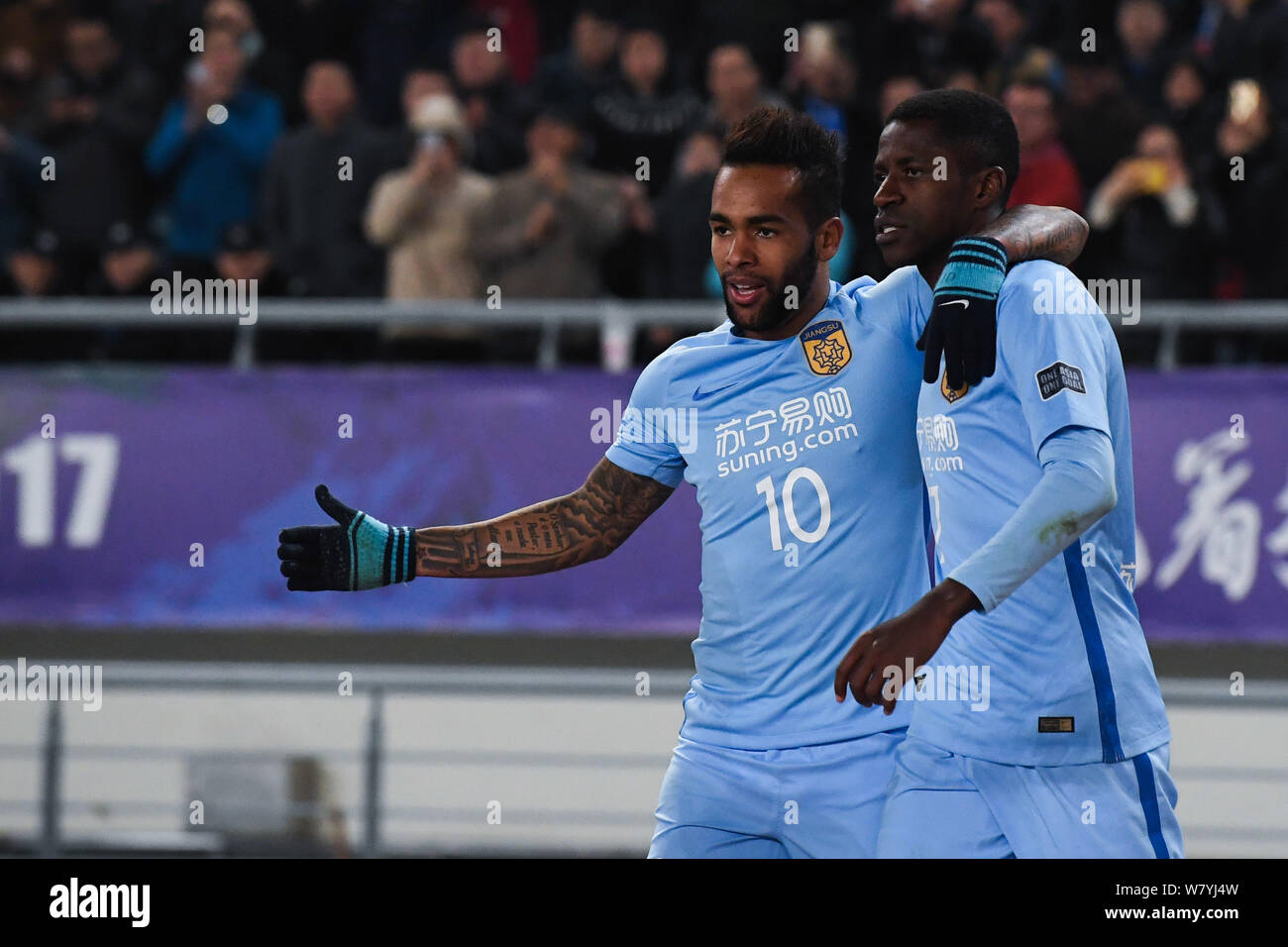 Brazilian football players Alex Teixeira left and Ramires of