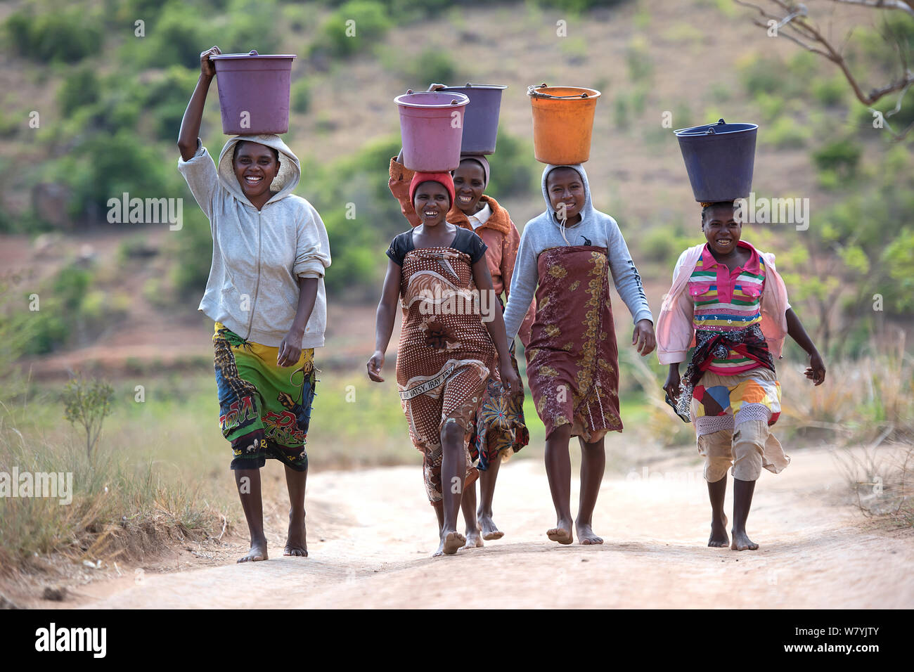 Carrying buckets of water hires stock photography and images Alamy