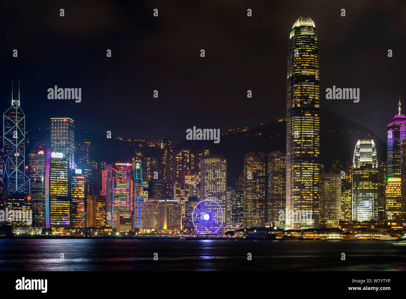 Skyline at Victoria Harbour at night, Hong Kong, SAR, China Stock Photo