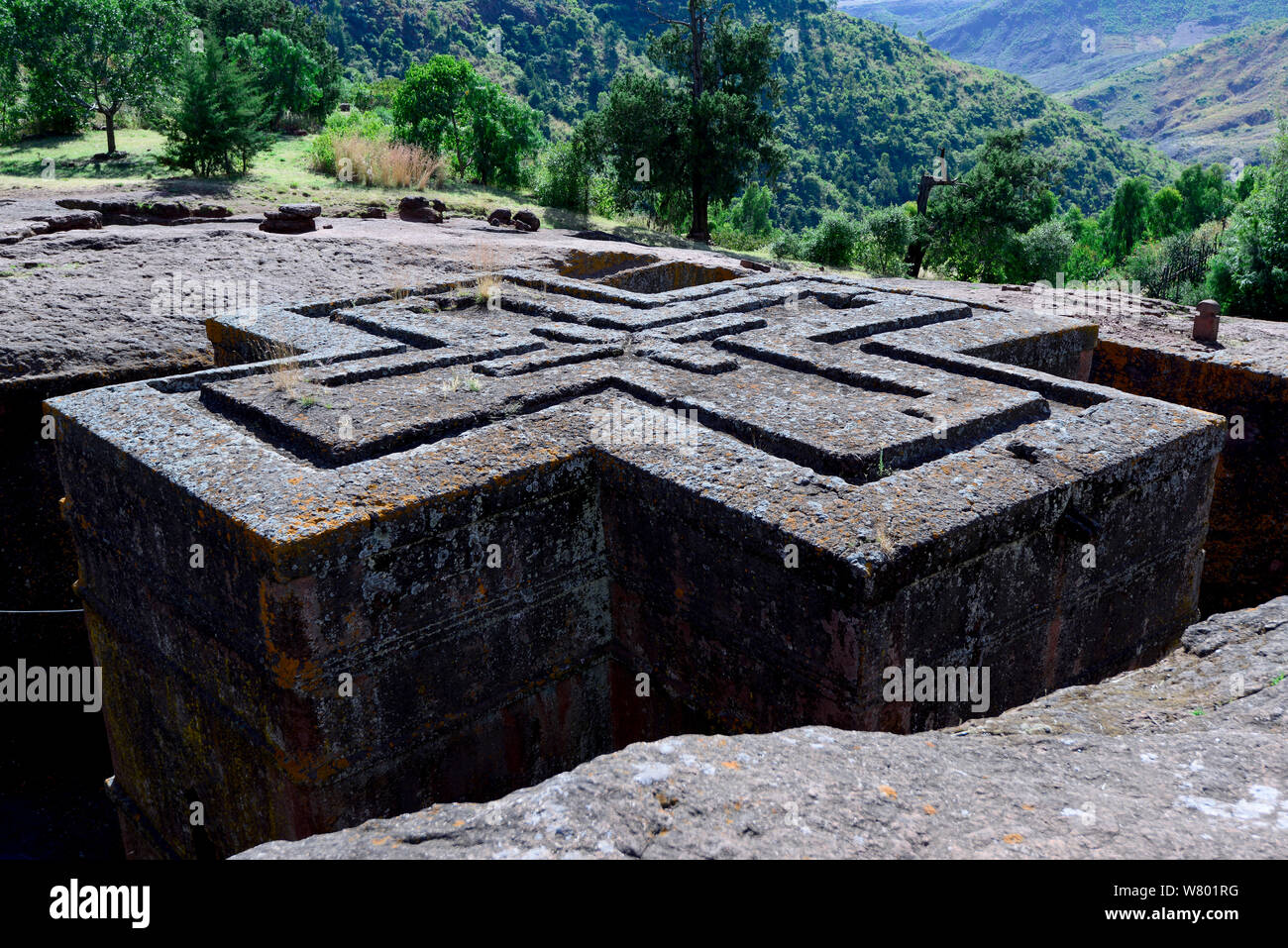 Bet Giyorgis Church, a church carved out of solid tufa rock, view from the top showing its cross shape, Lalibela. UNESCO World Heritage Site. Ethiopia, December 2014. Stock Photo