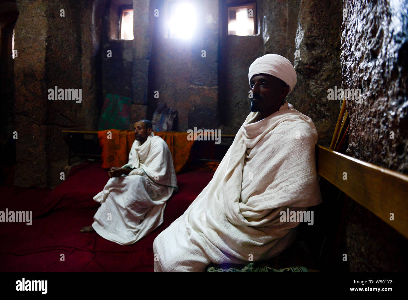 Christian priests. Bet Medhane Alem Complex (part of the northwestern group of churches in Lalibela). UNESCO World Heritage Site. Lalibela. Ethiopia, December 2014. Stock Photo