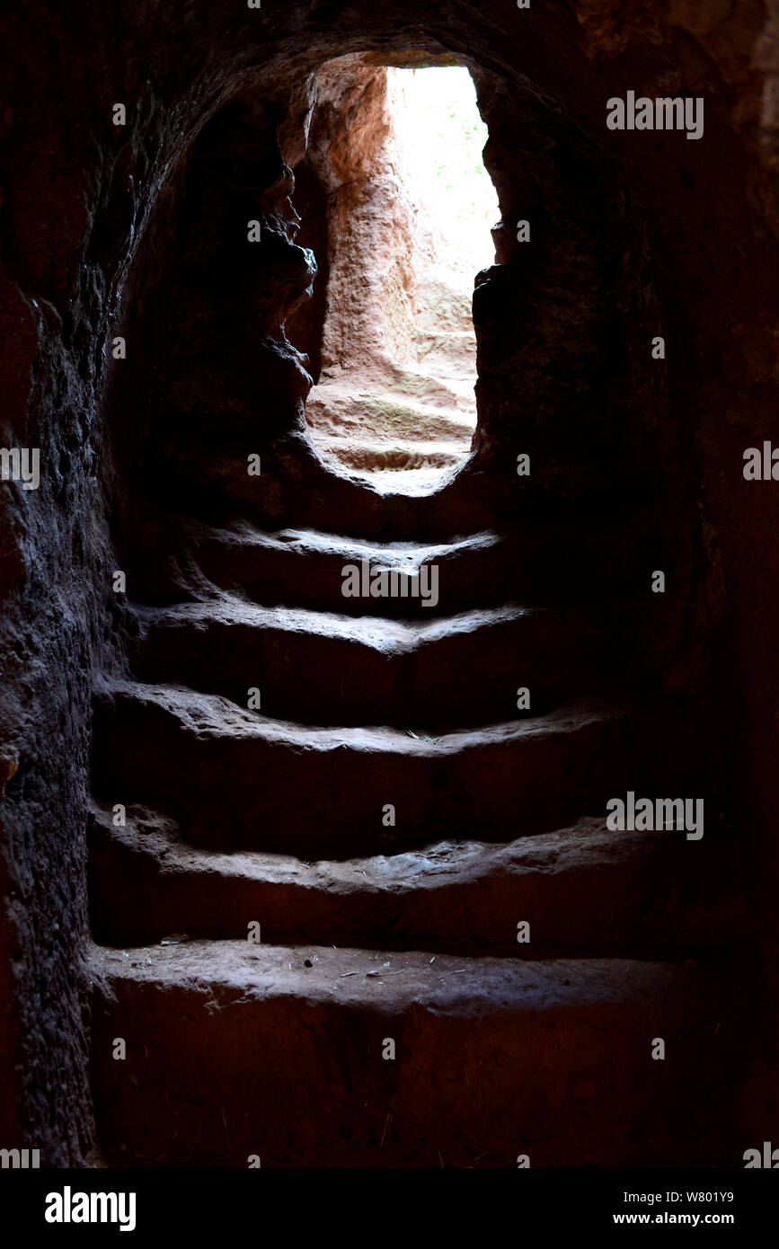 Stairs in an access tunnel to the churches of Lalibela. UNESCO World Heritage Site. Ethiopia, December 2014. Stock Photo