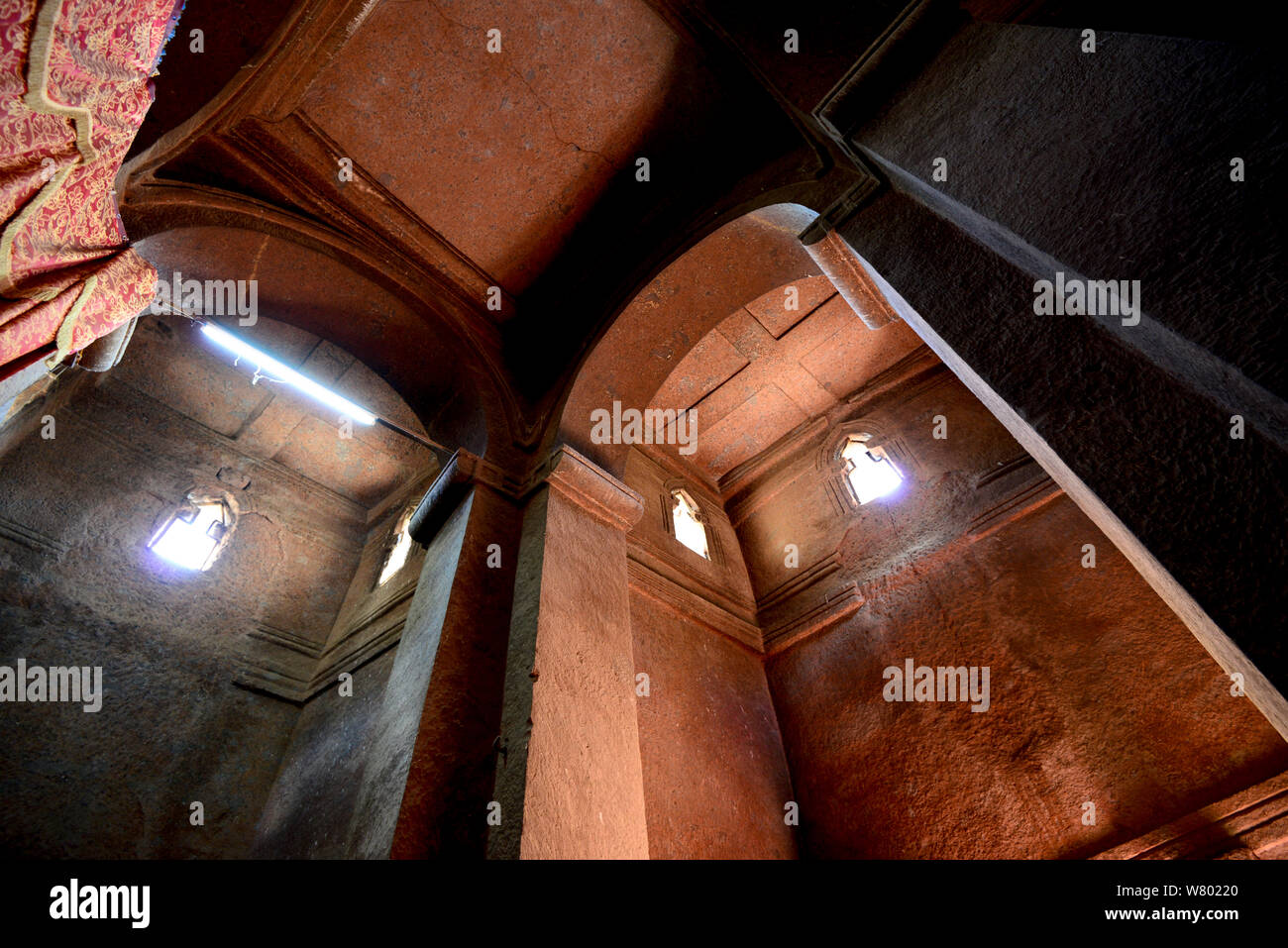 View looking up to archways, in rock hewn church - Bet Giyorgis Church, Lalibela. UNESCO World Heritage Site. Ethiopia, December 2014. Stock Photo