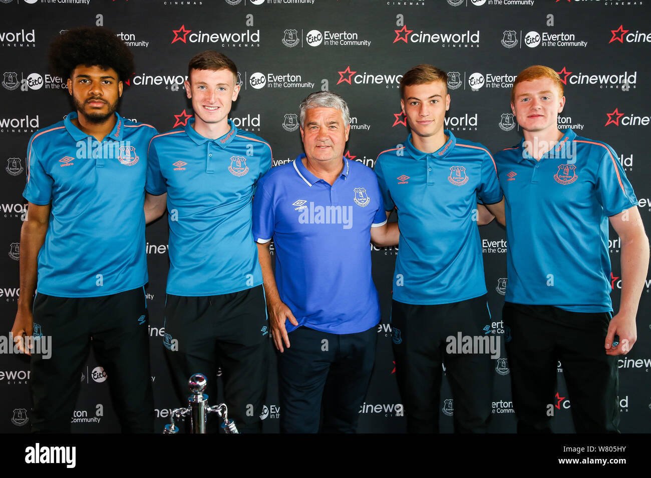 Everton U23 players (L-R) Ellis Simms, Joe Anderson, club ambassador Ian Snodin, Ryan Astley and captain Morgan Feeney pose for a picture during the Cineworld Speke Anniversary and Everton in the Community Screening in Liverpool. Stock Photo