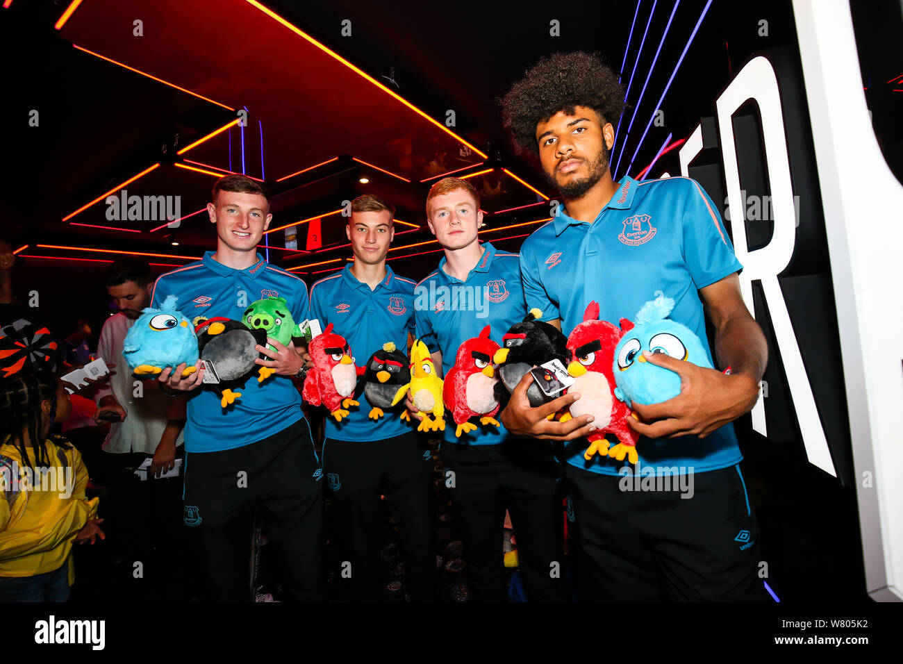 Everton U23 players Ellis Simms, Joe Anderson, Ryan Astley and captain Morgan Feeney pose for a picture with Angry Bird toys during the Cineworld Speke Anniversary and Everton in the Community Screening in Liverpool. Stock Photo