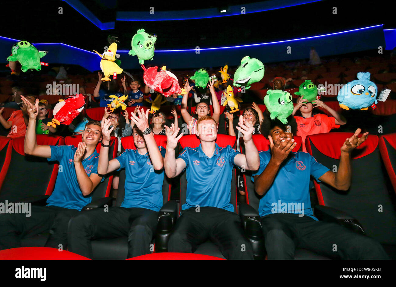 Everton U23 players Ellis Simms, Joe Anderson, Ryan Astley and captain Morgan Feeney pose for a picture with Angry Bird toys during the Cineworld Speke Anniversary and Everton in the Community Screening in Liverpool. Stock Photo