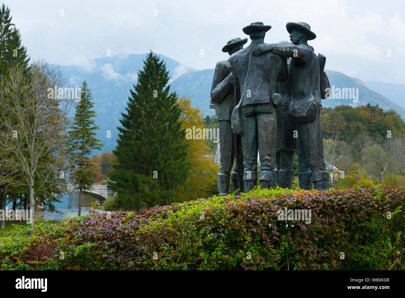 Statue of the first climbers of Triglav, Ribcev Laz, Lake Bohinj, Triglav National Park, Julian Alps, Slovenia, October 2014. Stock Photo