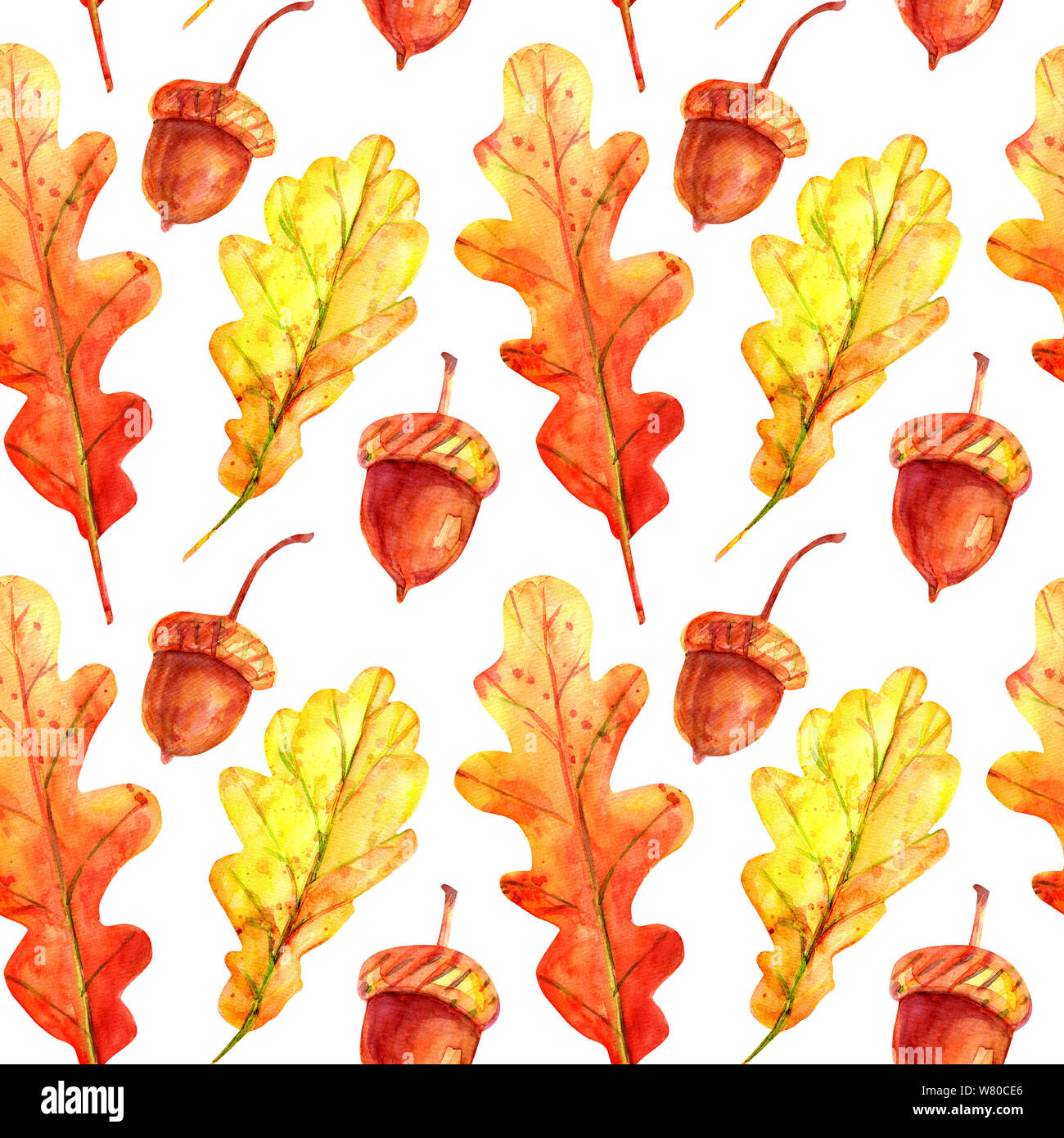 Seamless pattern with oak leaves and acorns. Watercolor autumn leaves fallen orange and yellow with colorful drops and sprays on a white background. T Stock Photo