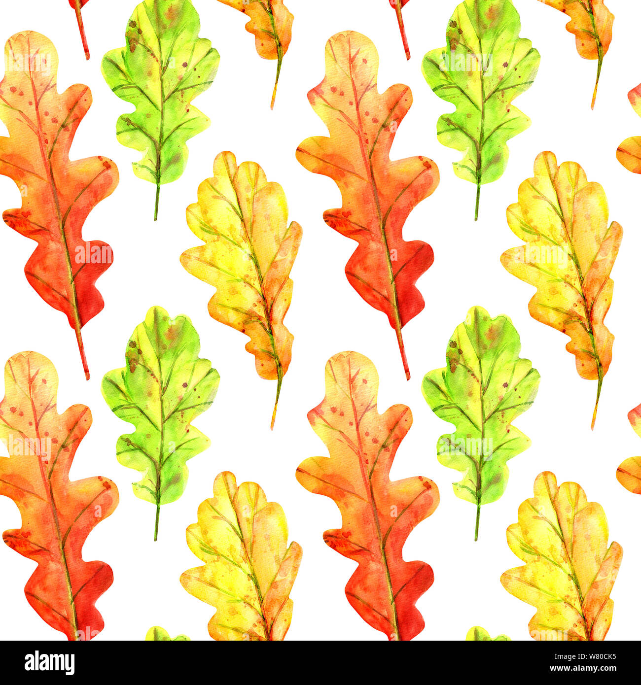 Seamless pattern with autumn oak leaves. Watercolor fallen leaves of green, orange and red with colorful drops and splashes on a white background. Tem Stock Photo