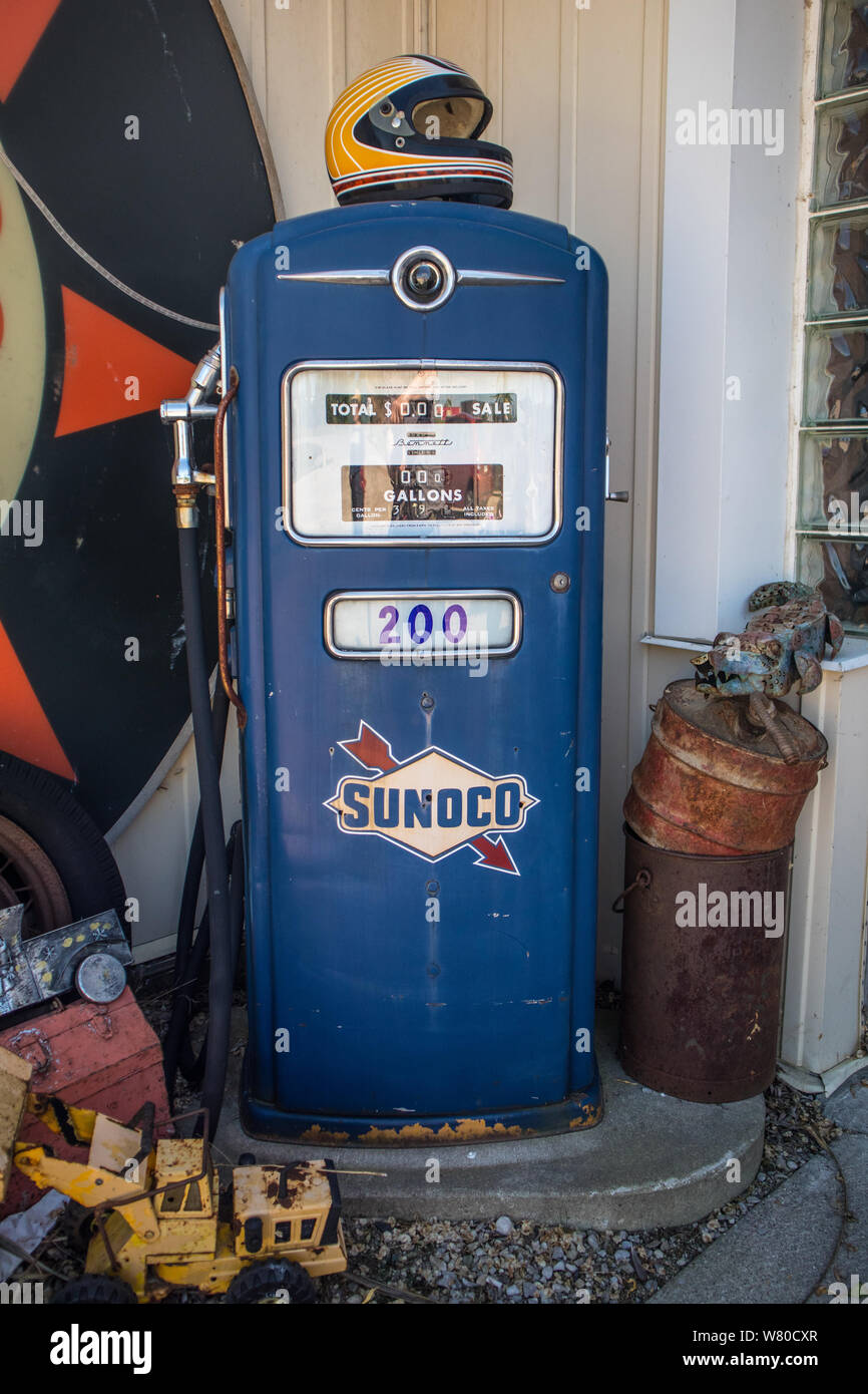 A vintage obsolete, out of order, gallons gauged Sunoco Blue 200 gas pump. Stock Photo