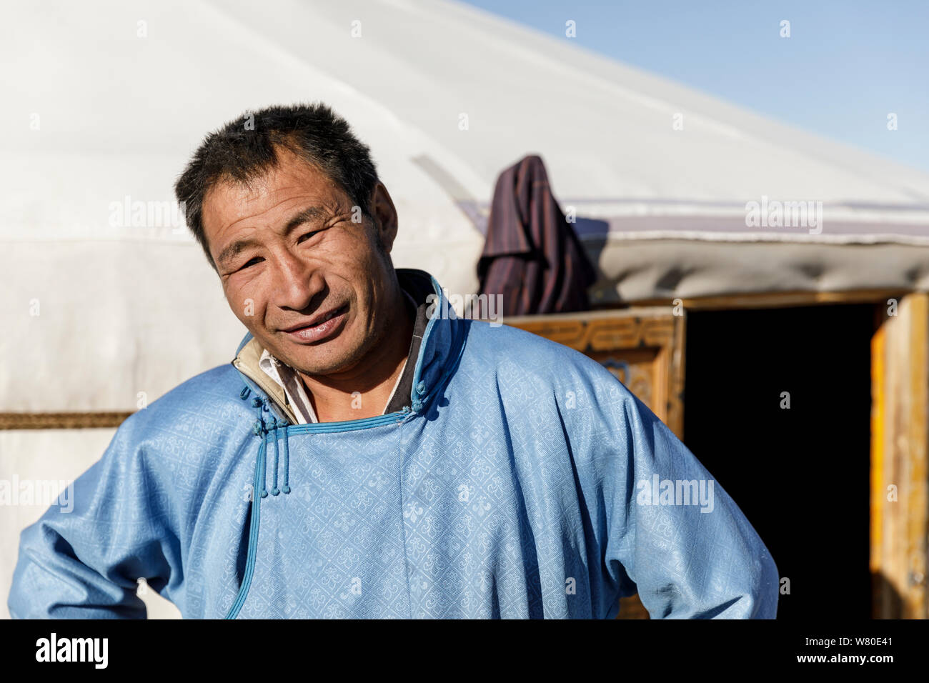 Mongolian man wearing the traditional deel. Stock Photo