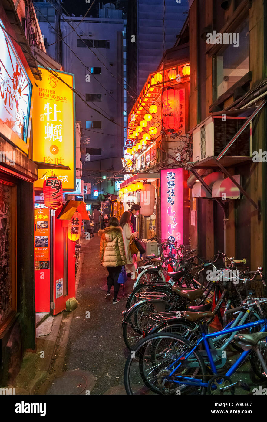 Side street at night in the Kabukichō district, Shinjuku, Tokyo, Japan Stock Photo