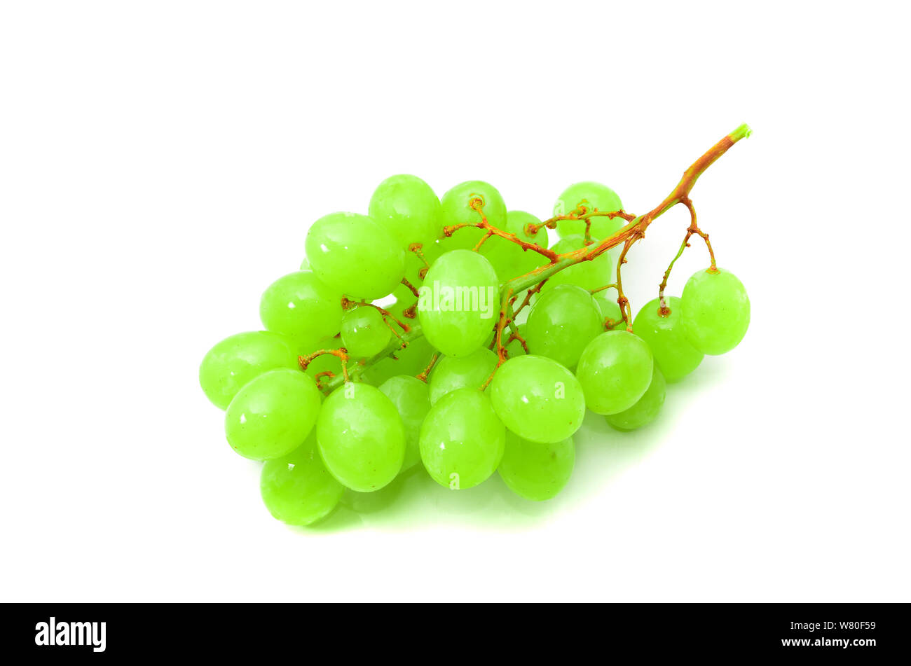 Fresh green grapes isolated on white background Stock Photo - Alamy