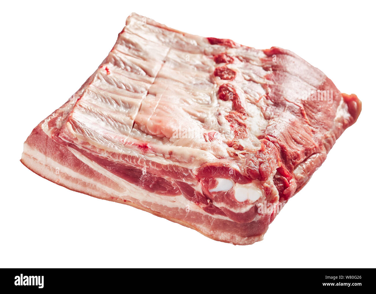 raw pork belly with spare ribs and skin isolated on the white background, view from above, close-up Stock Photo