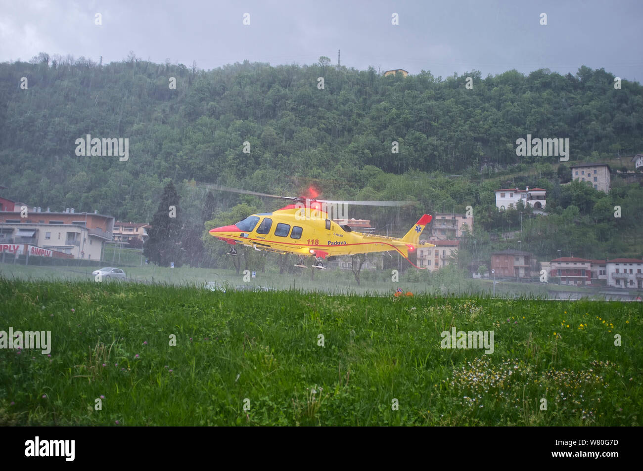 5, june, 2013 Valdagno - Italy: helicopter rescue of the Veneto Italian region takes off from the Valdagno city hospital under heavy rain Stock Photo