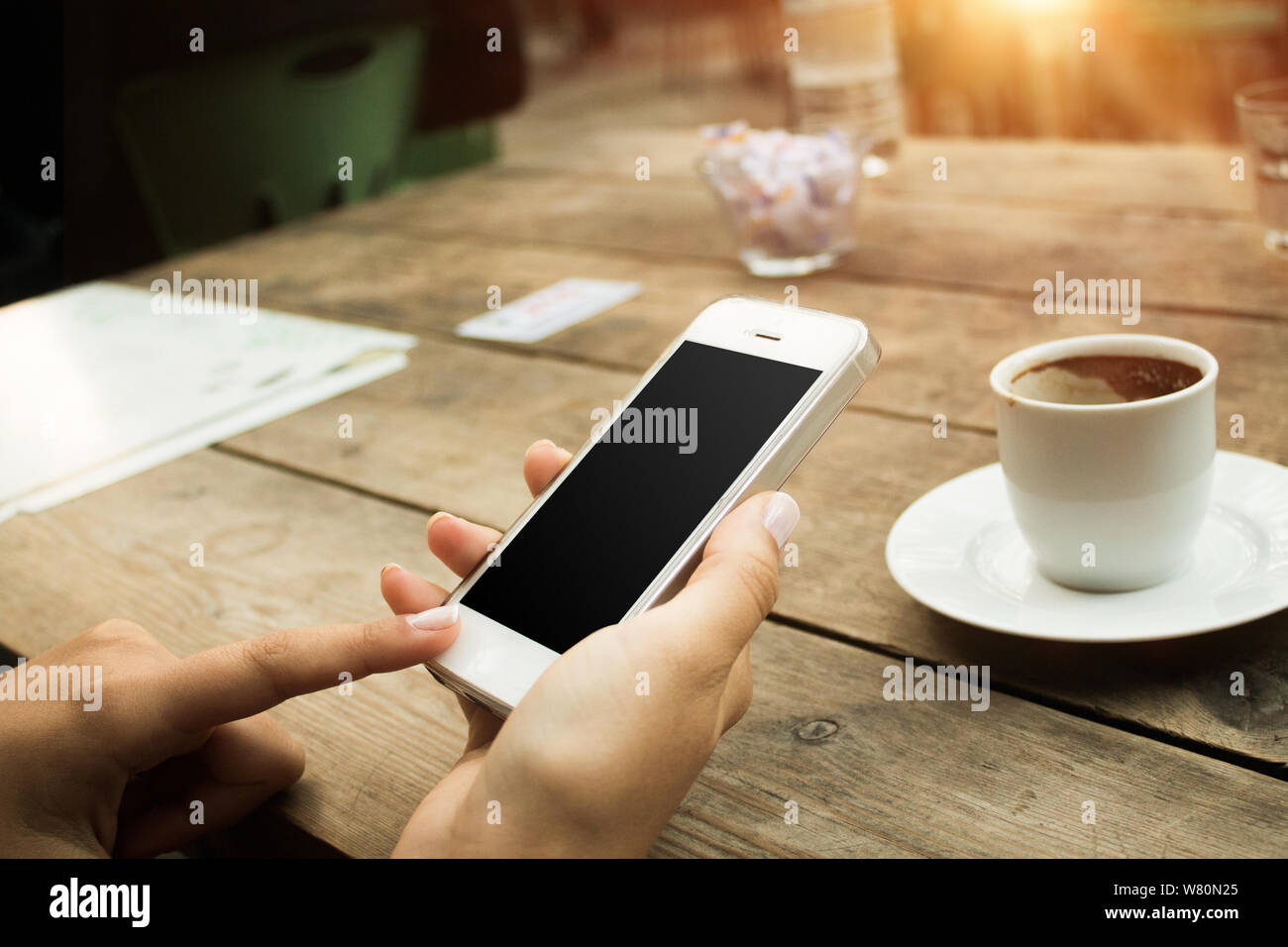Smartphone in hands. Clipping path included. Stock Photo