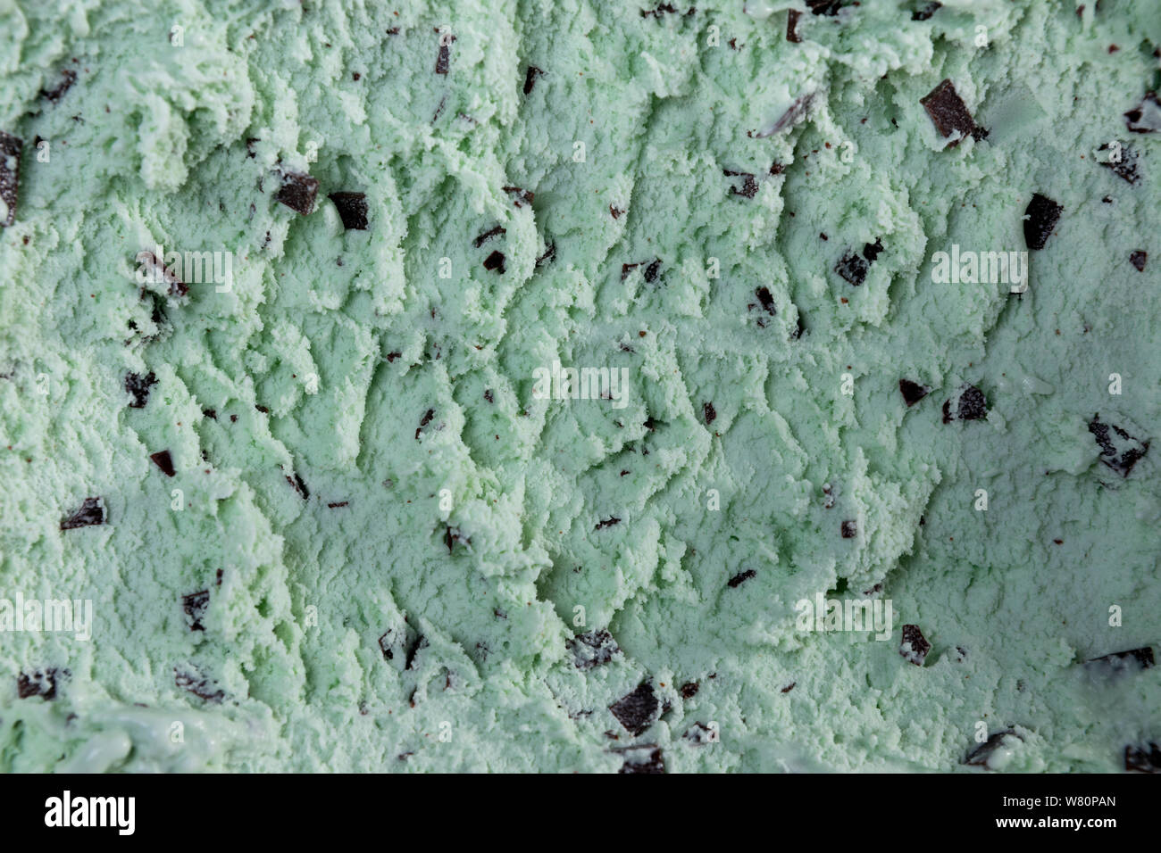 Top view of mint flavour ice cream with chocolate flakes in box Stock Photo