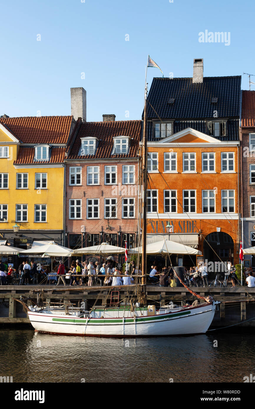 Copenhagen Denmark - a boat in Nyhavn canal, Copenhagen city centre in summer, Nyhavn Copenhagen Denmark Scandinavia Europe Stock Photo