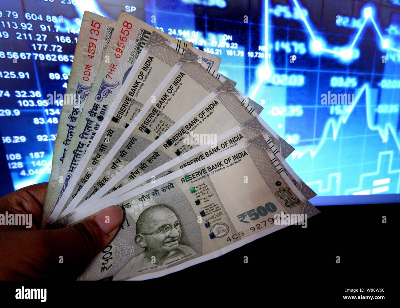 In this photo illustration the Indian currency notes are seen on display. Dollar price made its highest peak against the Indian rupee this week. Stock Photo