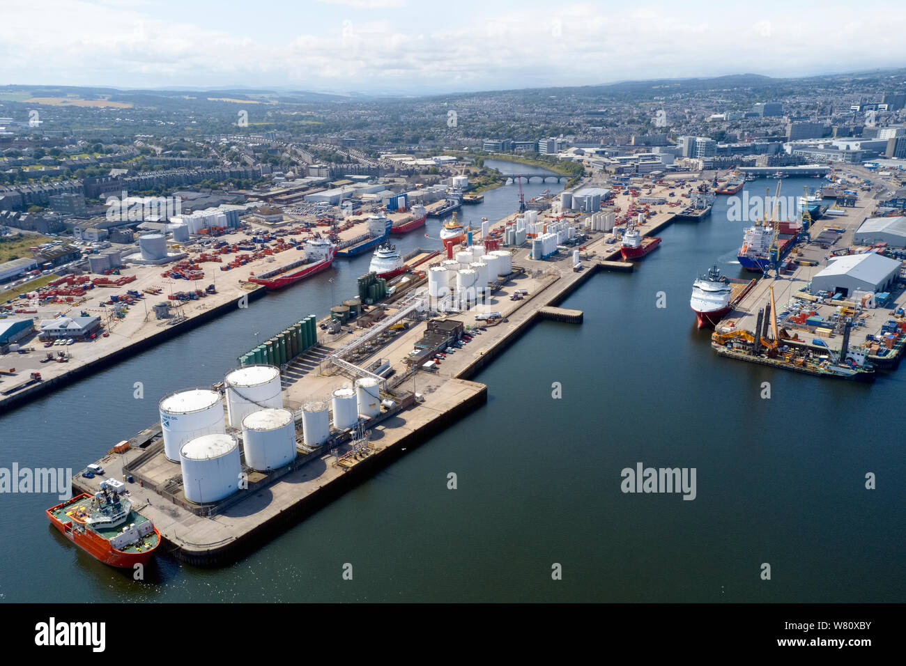 Aberdeen aerial view harbour ships with oil & gas tanks and north sea vessels Stock Photo