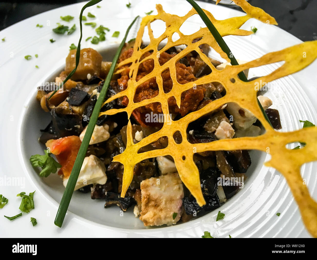 Vegetarian dish putted on a table, Alès, Gard, France Stock Photo