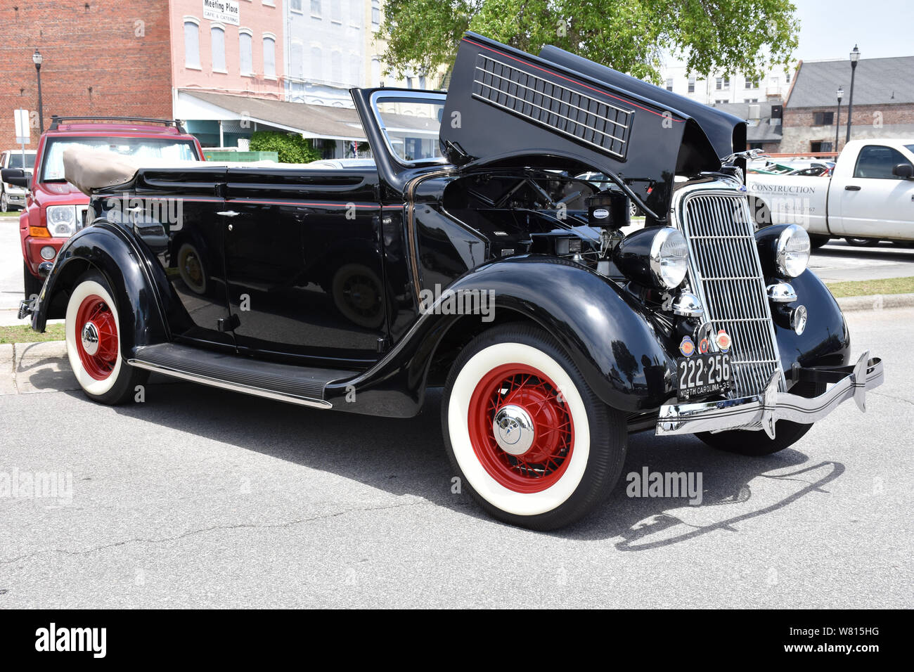 A 1935 Ford four door comvertible on display at a car show. Stock Photo