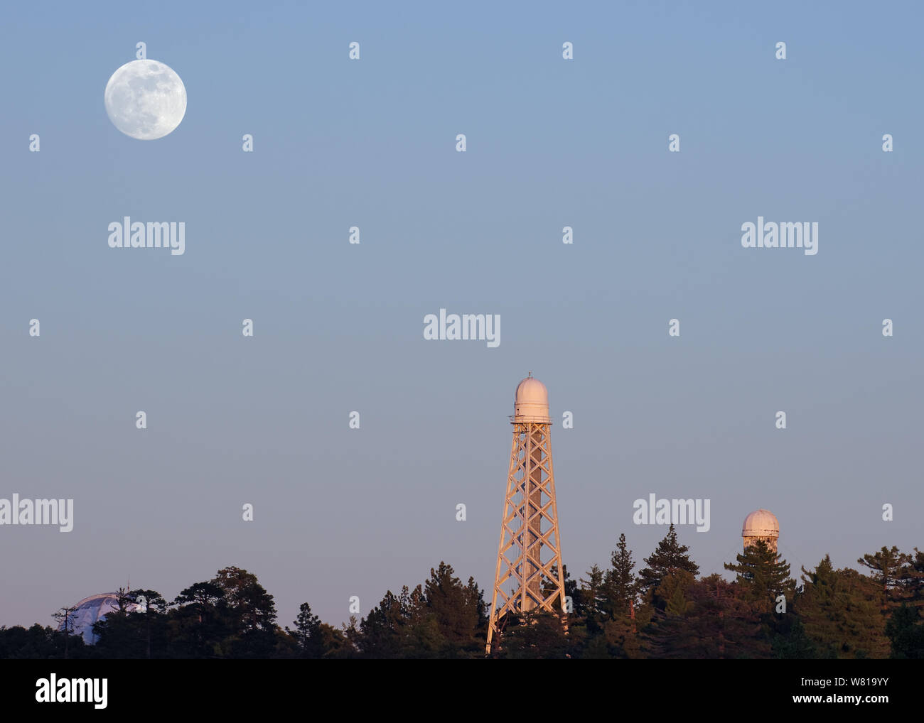 Moon rising at Mount Wilson Observatory in California. Mt Wilson is located on San Gabriel Mountains. Stock Photo