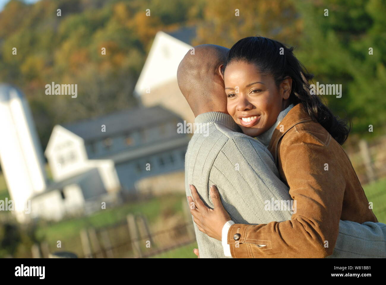 Couple in sweaters during autumn Stock Photo