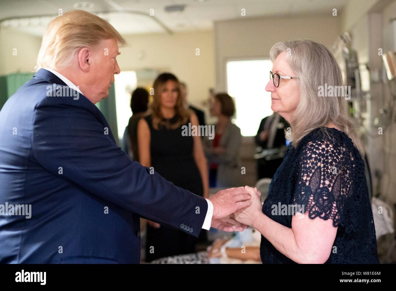 Dayton, United States Of America. 07th Aug, 2019. U.S President Donald Trump visits with family members at Miami Valley Hospital August 7, 2019 in Dayton, Ohio. Nine people were killed in a shooting in the Oregon District of Dayton, Ohio the day after 31 people were killed in mass shootings in El Paso. Credit: Planetpix/Alamy Live News Stock Photo