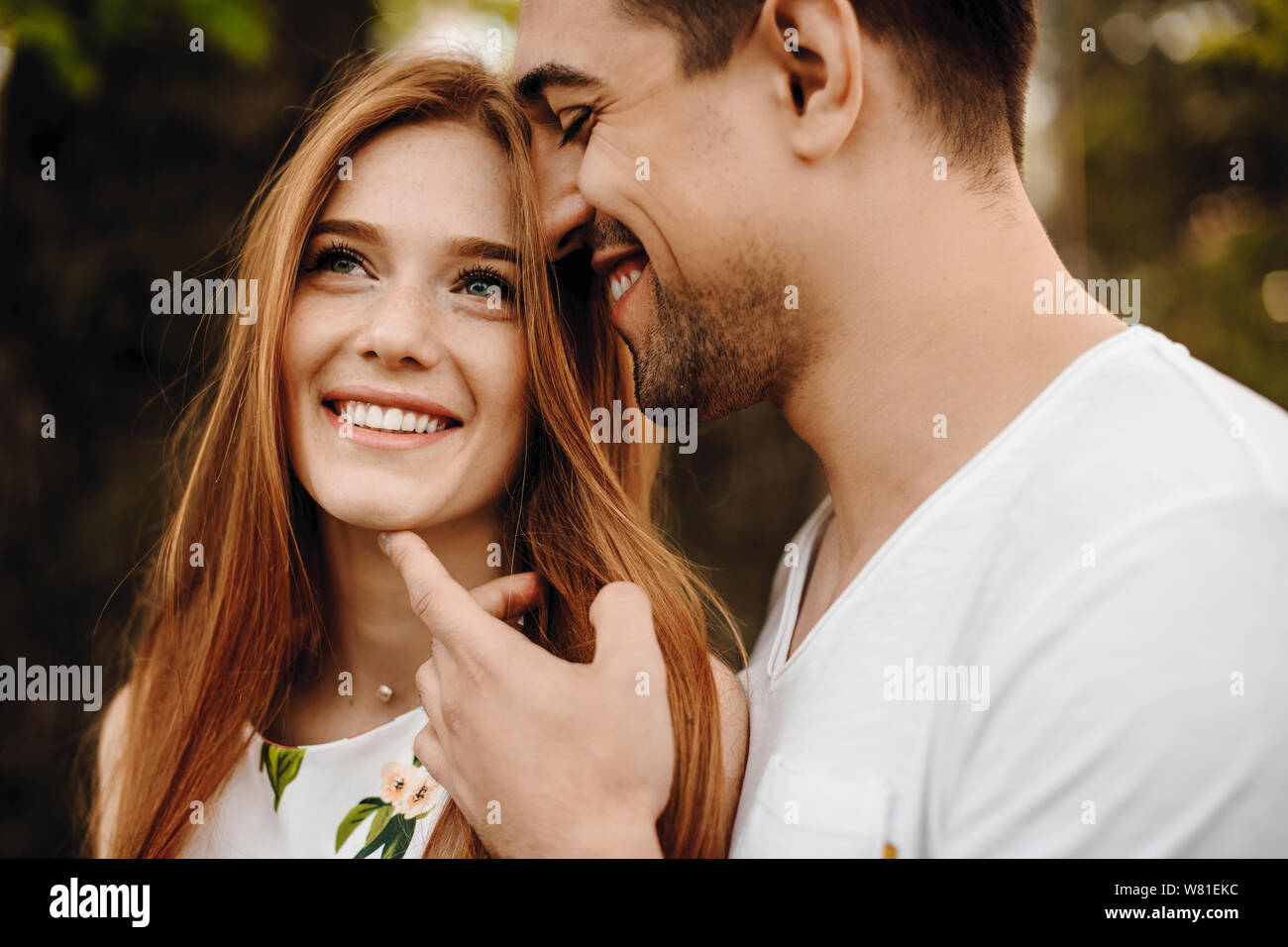 Woman touching boyfriend face with hand hi-res stock photography and images  - Alamy