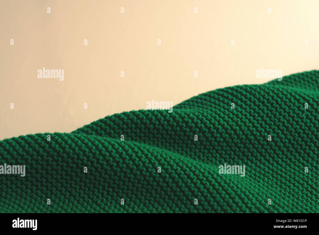Green woollen sweater, texture detail close up Stock Photo - Alamy