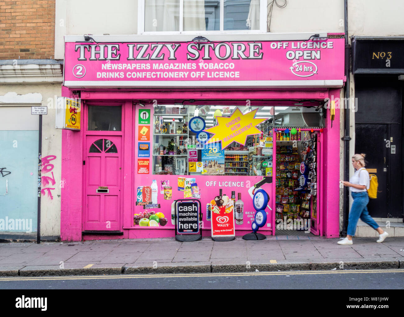 Bright pink shop front the Izzy Store Off Licence, Brighton East Sussex ...