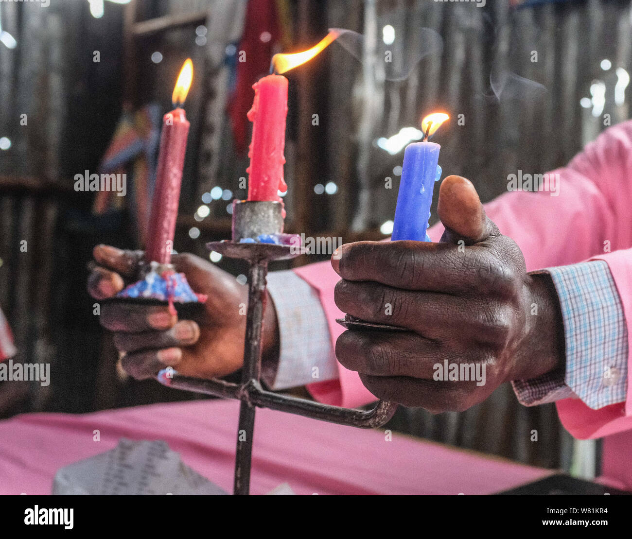 The holly candles burning at a local Church.The traditional beliefs and  practices of African people are a set of highly diverse beliefs that  include various ethnic religions. Many Kenyans have started their, image size:1300x1109