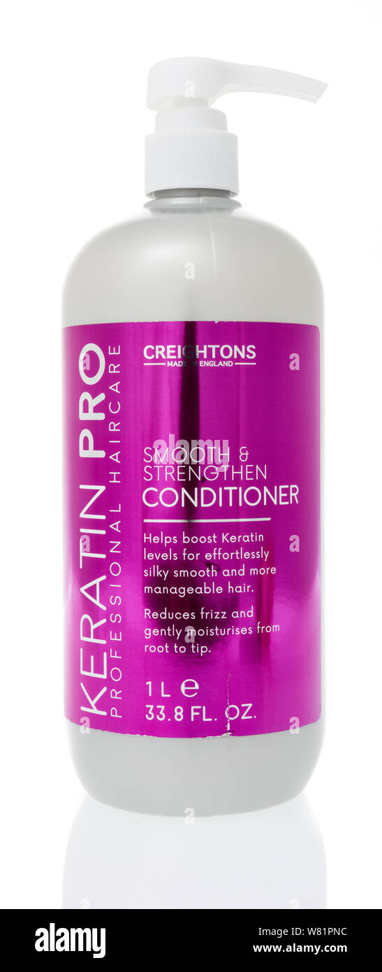 Winneconne, WI - 15 July 2019 : A package of Creightons smooth and strengthen conditioner Keratin Pro  on an isolated background Stock Photo