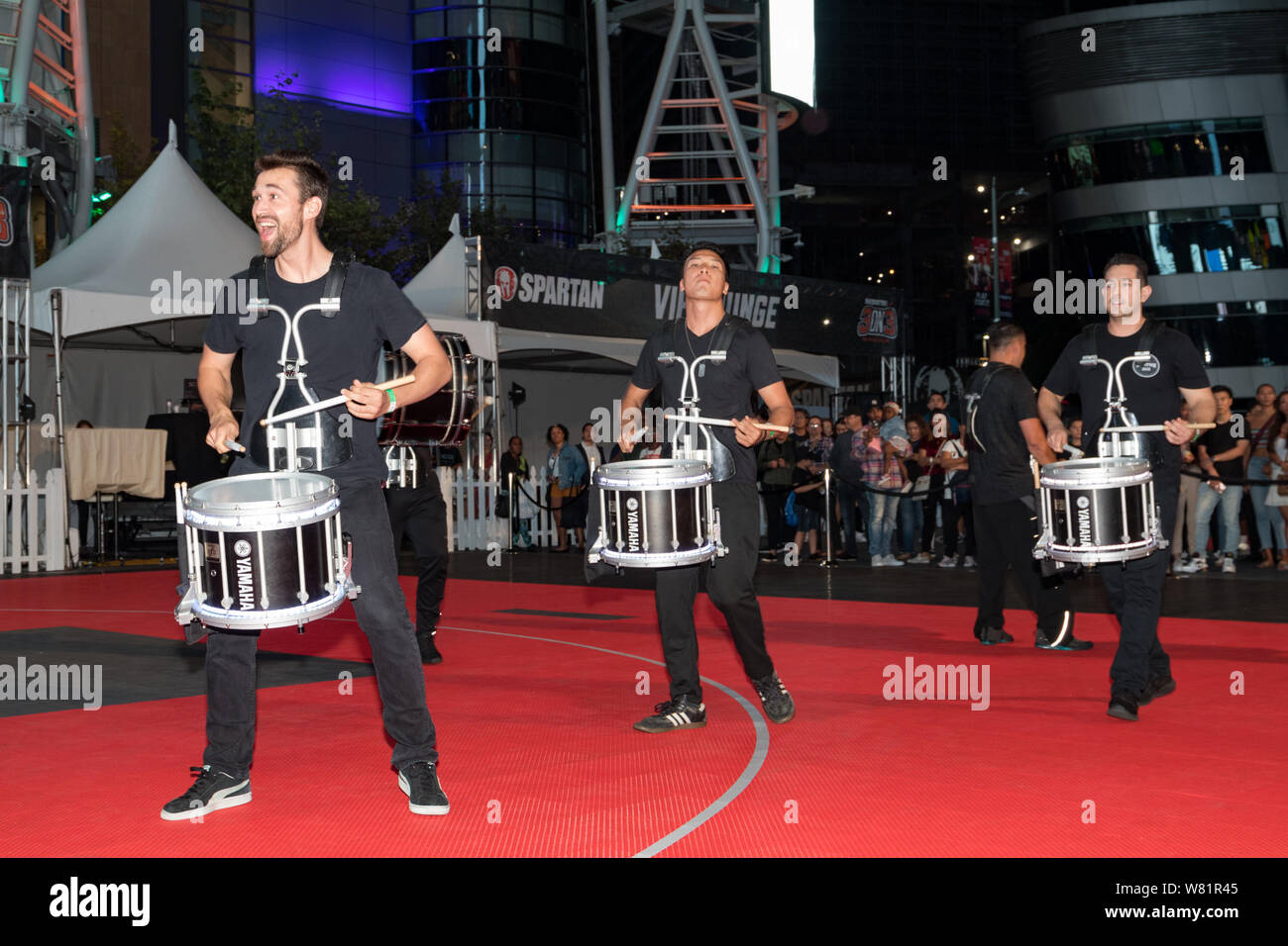 LOS ANGELES, CA, USA - AUGUST 2, 2019: Downtown Dark Nights Event at L.A. LIVE in the Xbox Plaza. A drumline live performance. Stock Photo