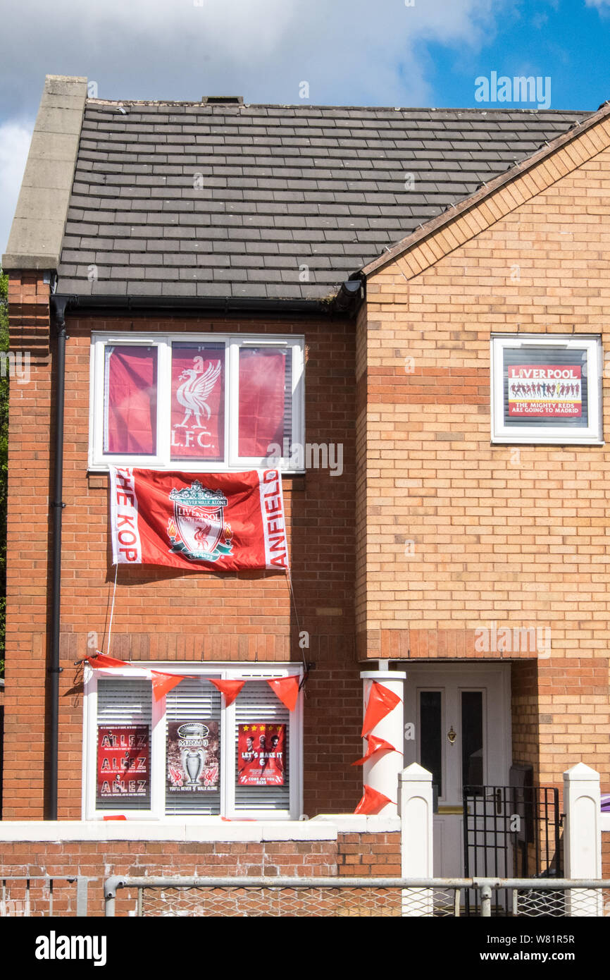 Liverpool FC,Liverpool Football Club,team colours,flag,flags,in,window,at,house,in,Liverpool,city,centre,North,Northern,city,UK,GB,Britain,British, Stock Photo