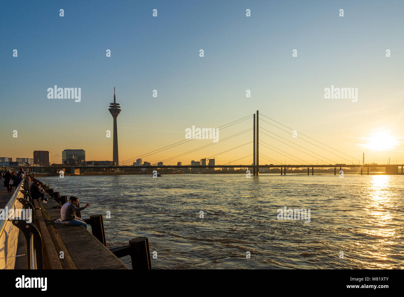 Rhine Riverside Outdoor scenery of people walk and sit for enjoy nice atmosphere at ...